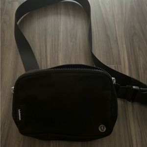 Black lululemon belt bag - hardly used